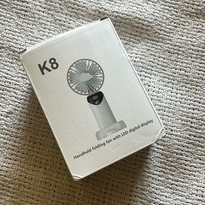 Handheld folding fan